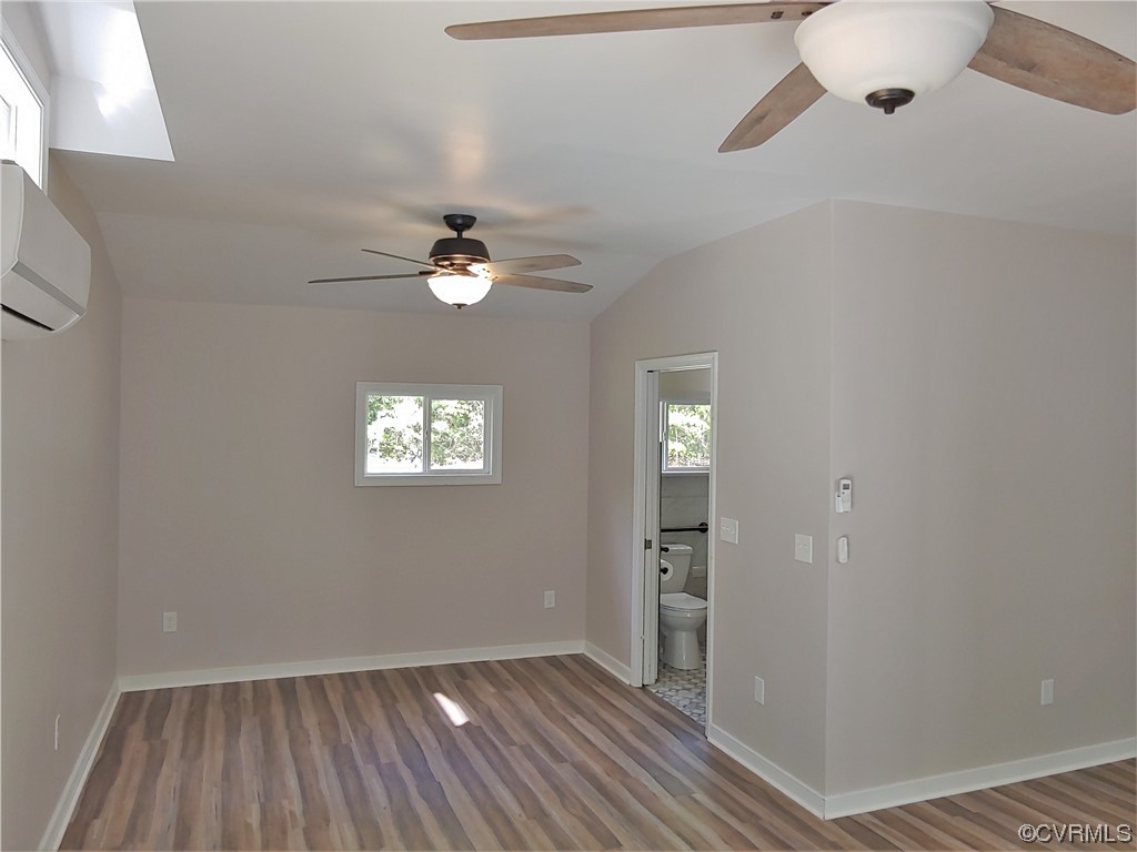 13569 Greenwood Road Glen Allen, VA 23059 - Photo 31 of 49 wooden floor in an empty room with a window