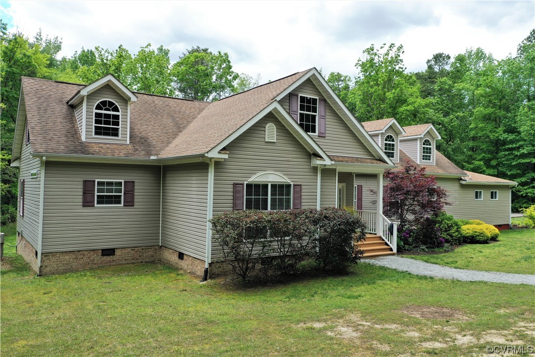 13569 Greenwood Road Glen Allen, VA 23059 - Photo 38 of 49 a view of a house with a yard