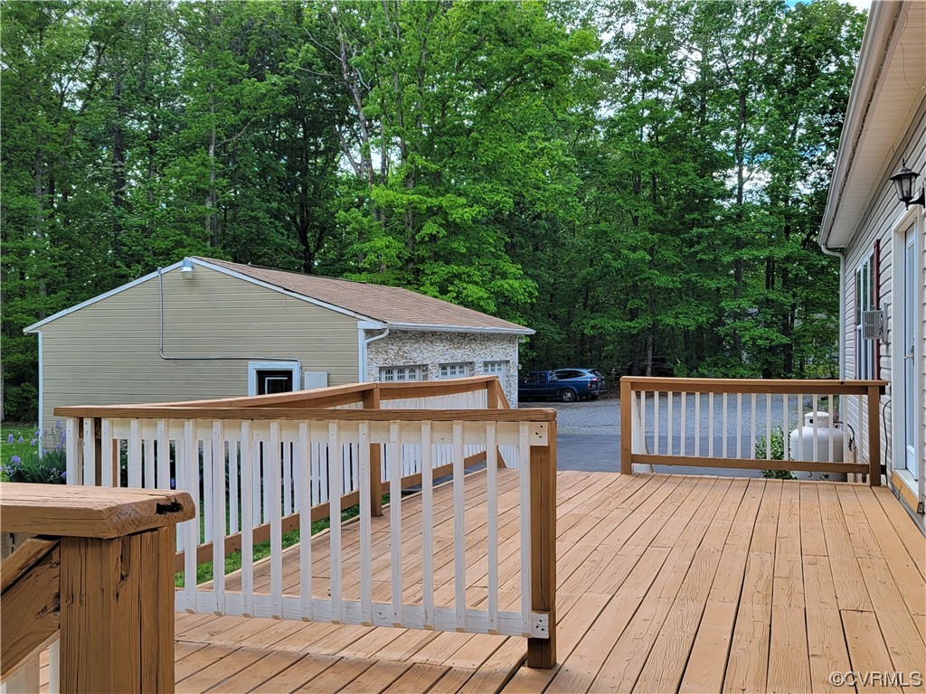 13569 Greenwood Road Glen Allen, VA 23059 - Photo 43 of 49 a view of wooden deck and a patio with swimming pool