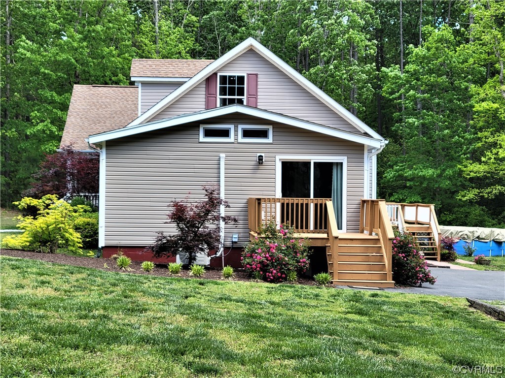 13569 Greenwood Road Glen Allen, VA 23059 - Photo 44 of 49 a front view of house with yard and green space