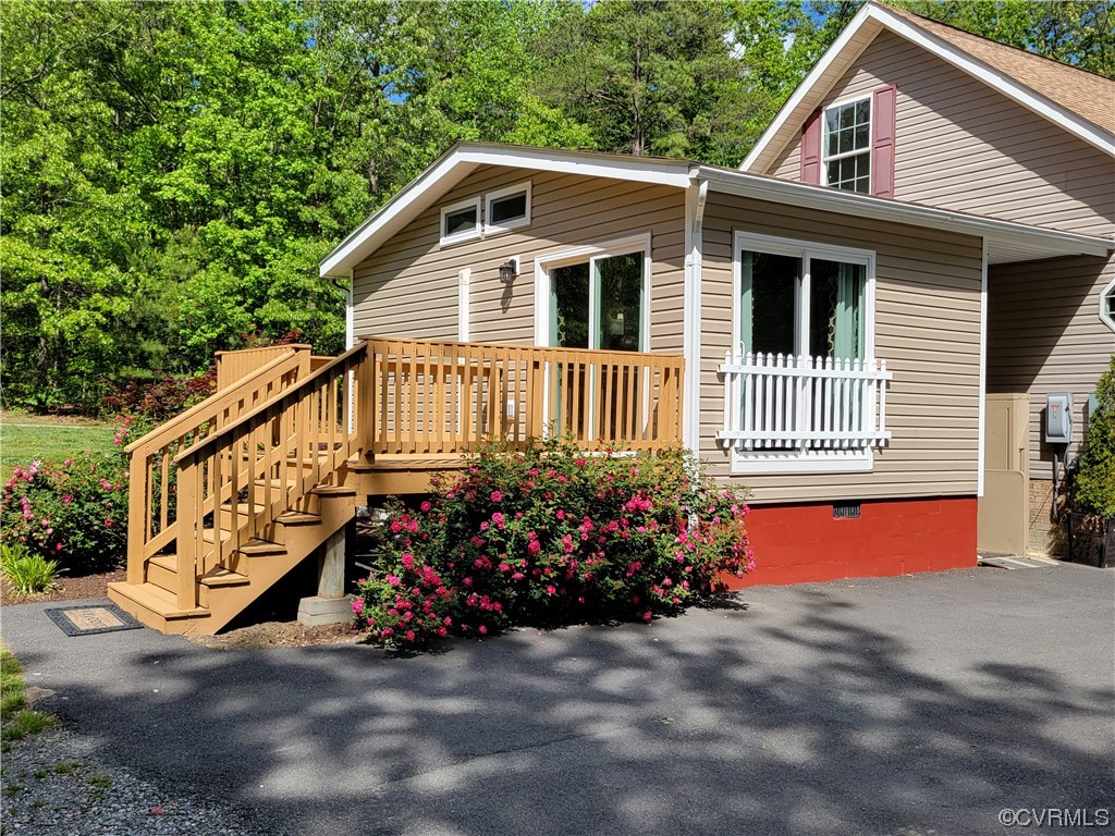 13569 Greenwood Road Glen Allen, VA 23059 - Photo 45 of 49 a view of a house with a yard and potted plants