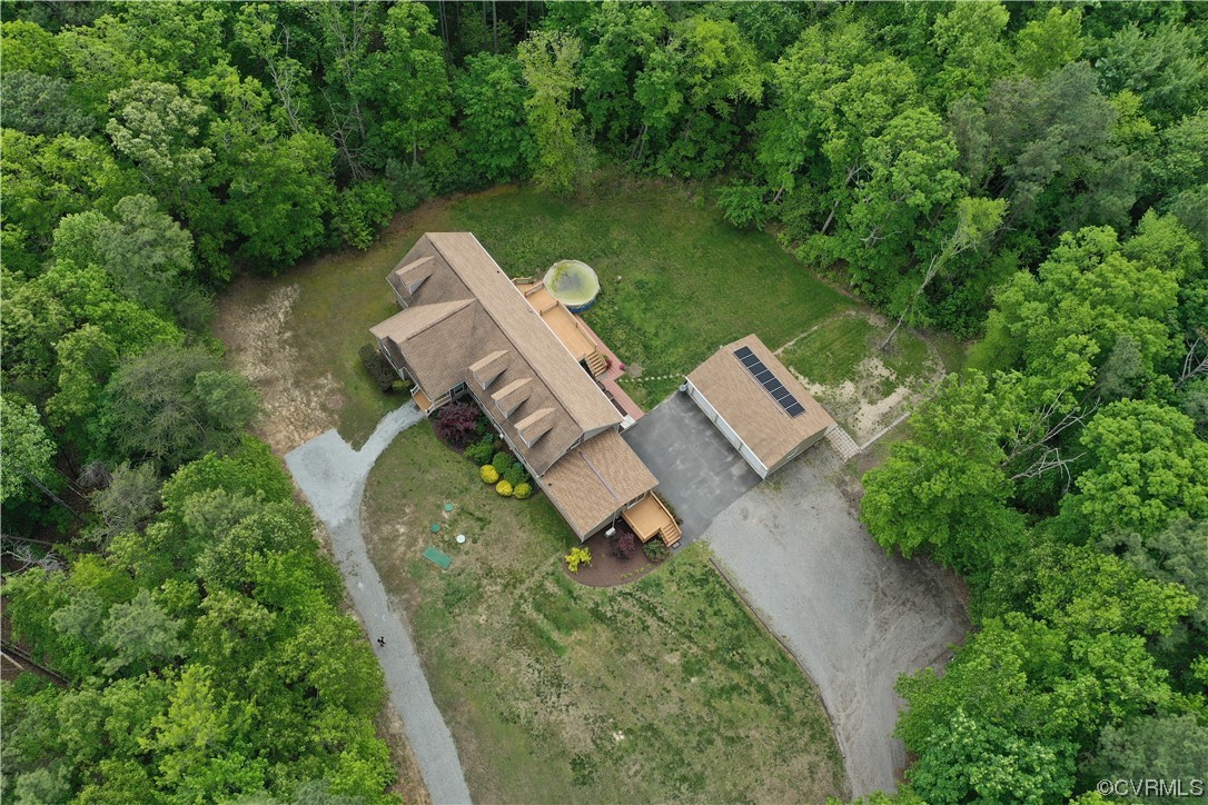 13569 Greenwood Road Glen Allen, VA 23059 - Photo 49 of 49 an aerial view of a house with a yard and trees
