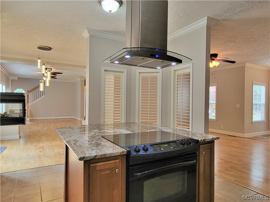 13569 Greenwood Road Glen Allen, VA 23059 - Photo 9 of 49 a kitchen with a stove and a sink
