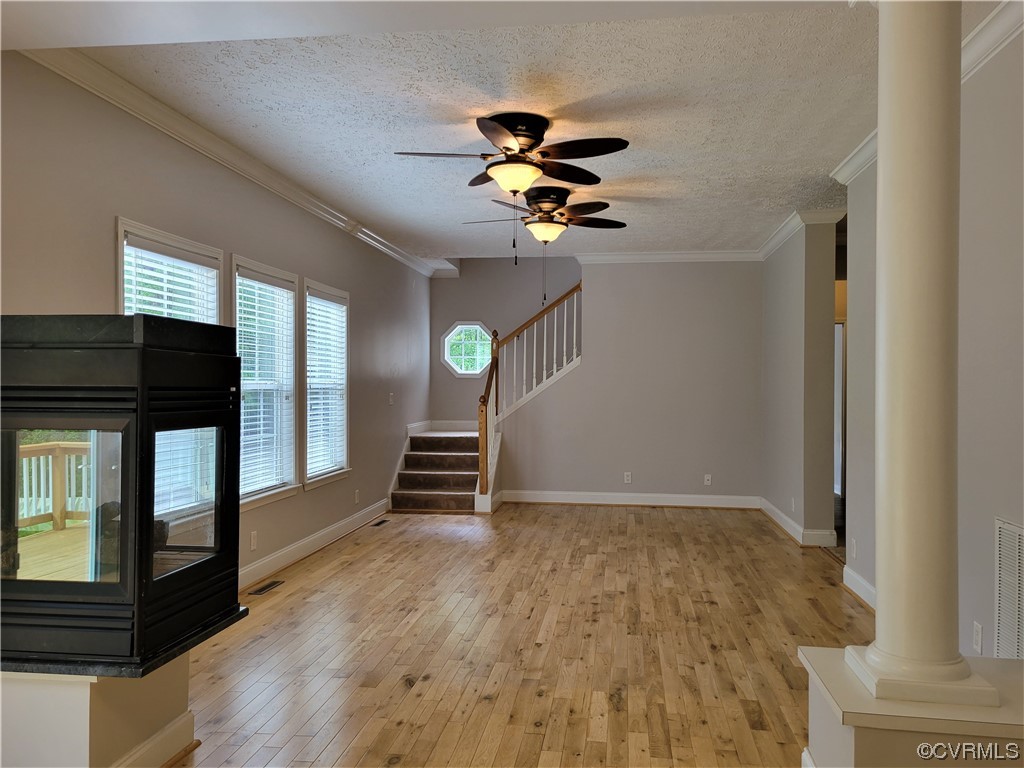 13569 Greenwood Road Glen Allen, VA 23059 - Photo 10 of 49 a view of empty room with wooden floor and fan