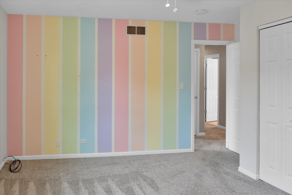 24457 South Tree Ridge Court Channahon, IL 60410 - Photo 24 of 32 a view of a hallway with painted walls