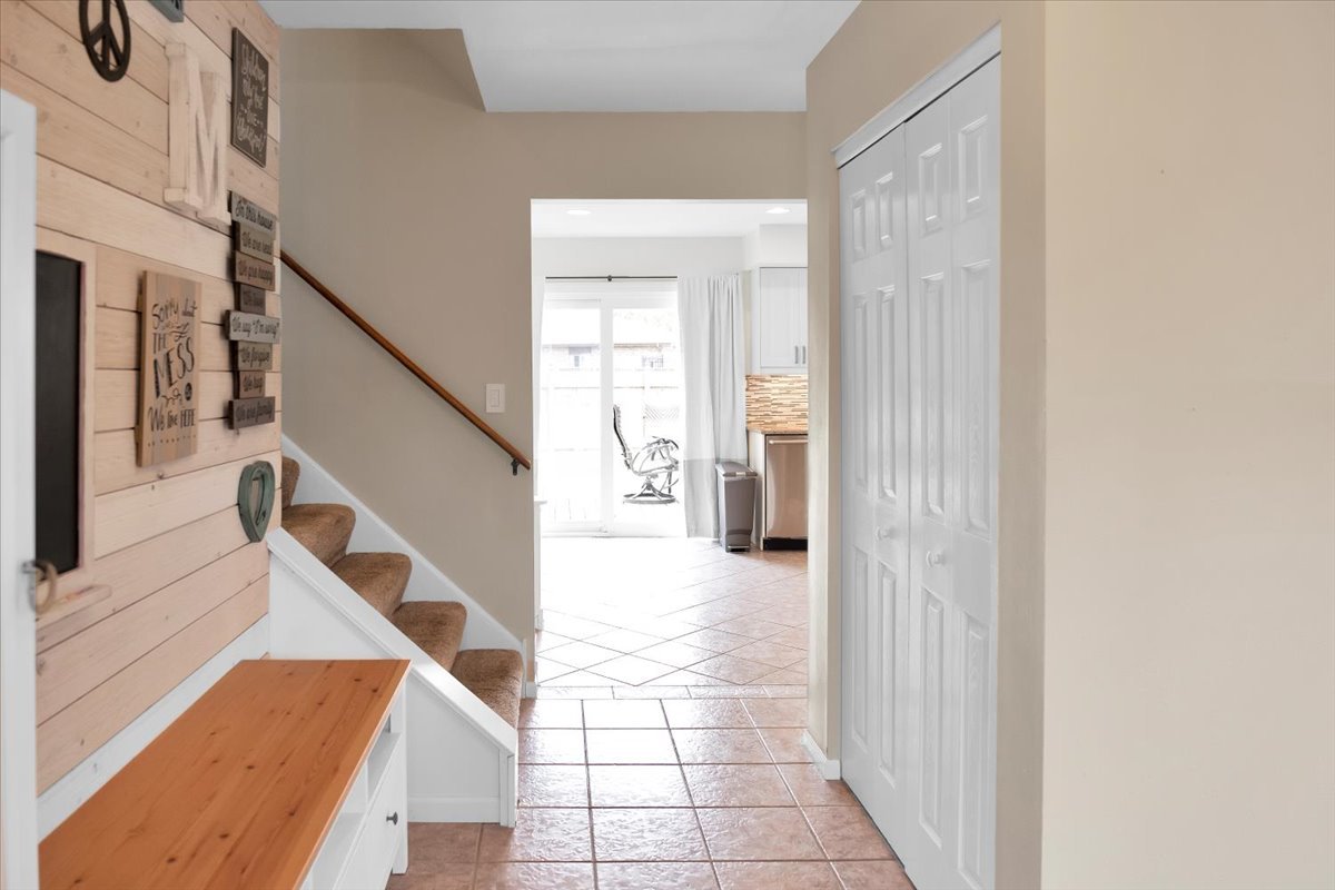 24457 South Tree Ridge Court Channahon, IL 60410 - Photo 3 of 32 a view of a hallway with wooden floor and staircase