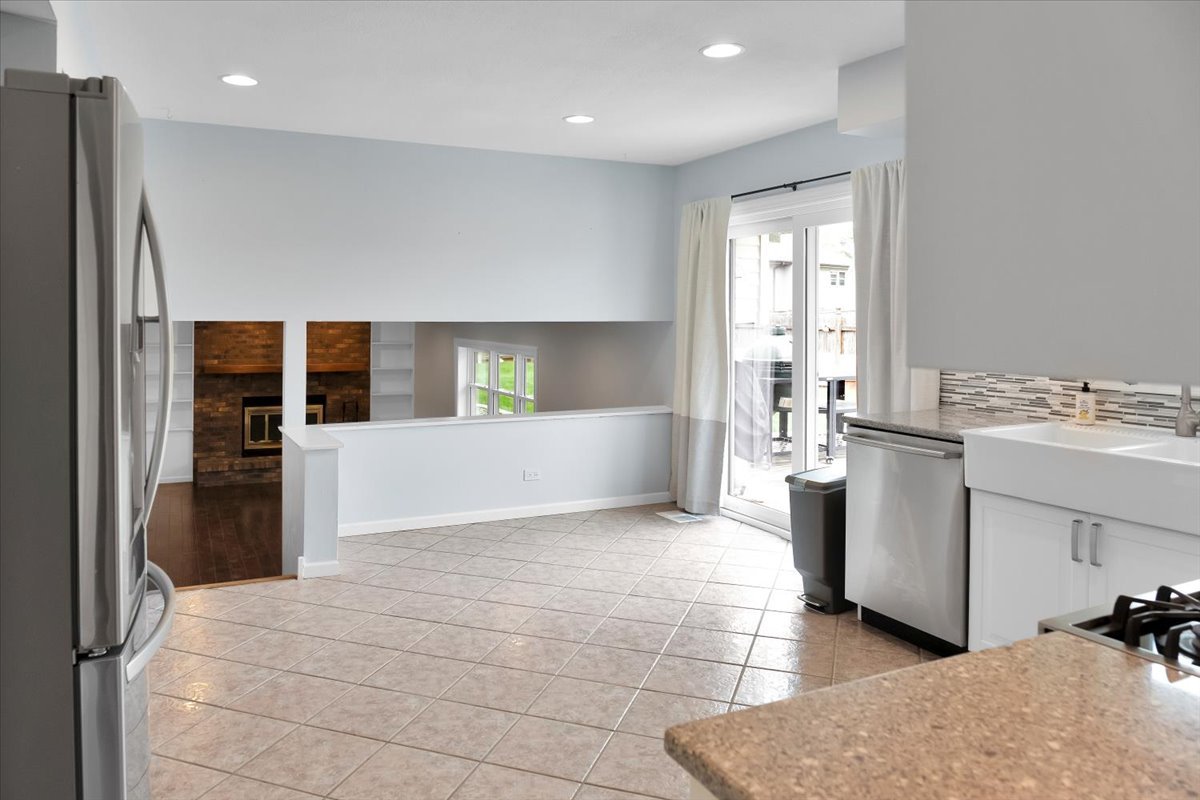 24457 South Tree Ridge Court Channahon, IL 60410 - Photo 8 of 32 a view of a kitchen with a sink