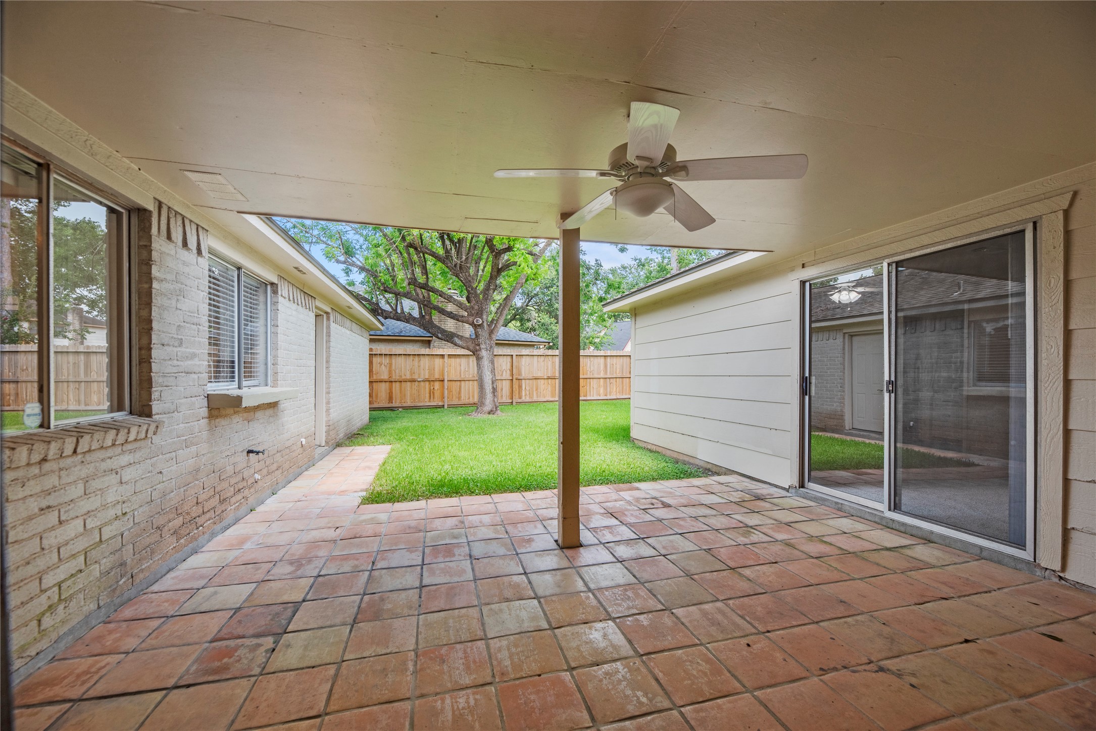 6931 Sandy Knolls Drive Spring, TX 77379 - Photo 12 of 21 POV from Living Room, with a sliding glass window for easy access from your kitchen
**6931 Sandy Knolls Dr., Spring, TX 77379**