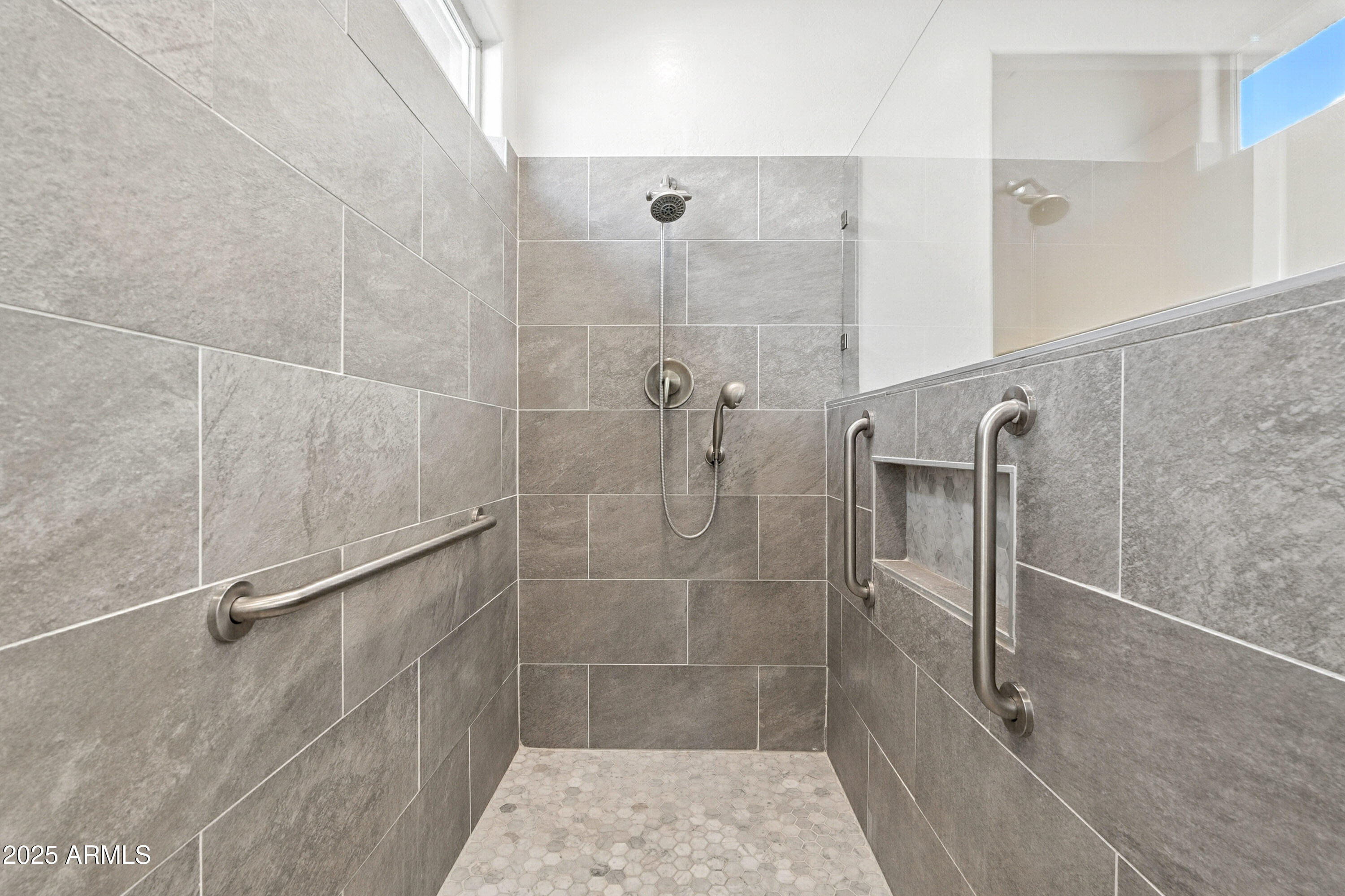 2816 West Pollack Street Phoenix, AZ 85041 - Photo 25 of 63 a bathroom with a shower