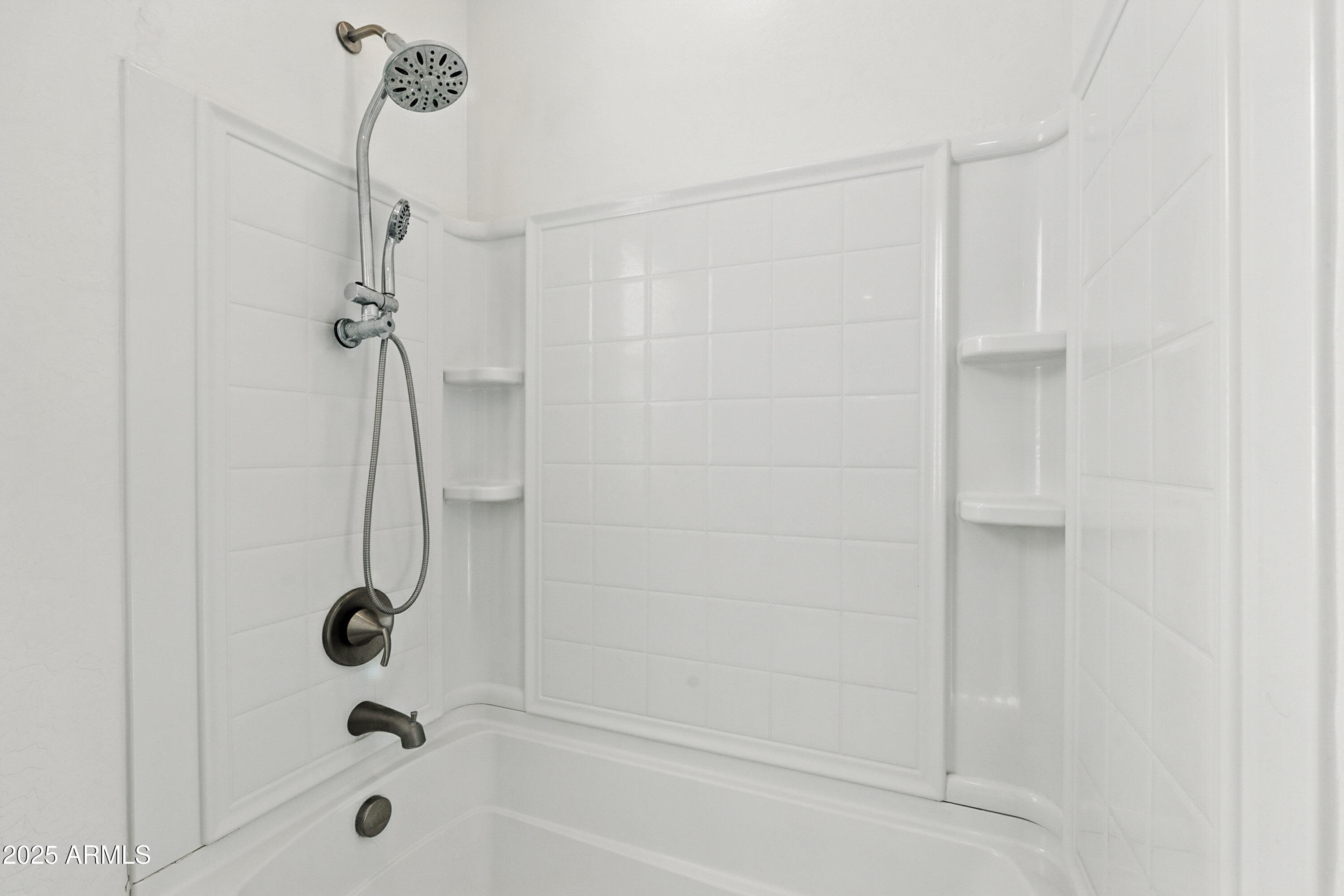 2816 West Pollack Street Phoenix, AZ 85041 - Photo 32 of 63 a bathroom with a shower