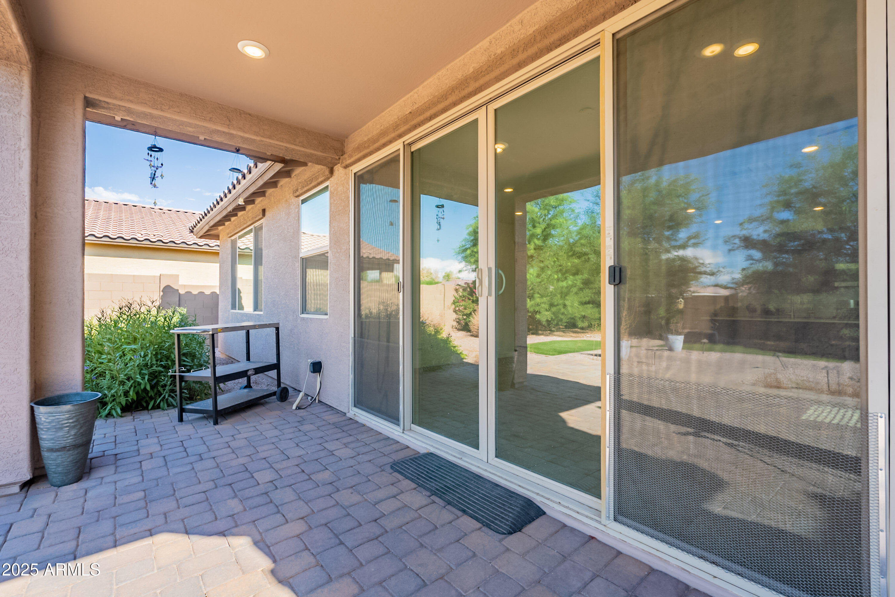 2816 West Pollack Street Phoenix, AZ 85041 - Photo 38 of 63 a room with a large window and outdoor space