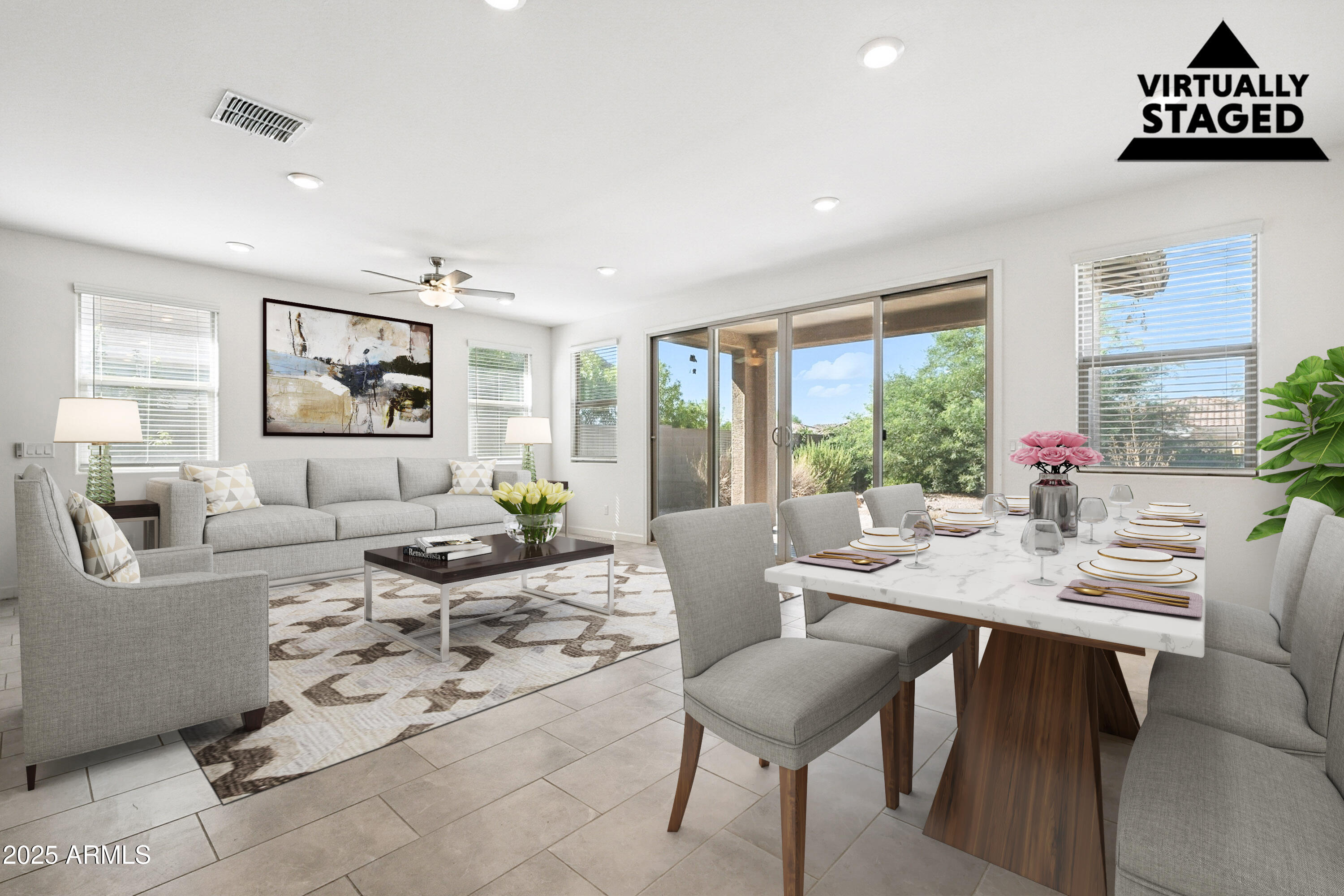 2816 West Pollack Street Phoenix, AZ 85041 - Photo 4 of 63 a living room with furniture and a large window