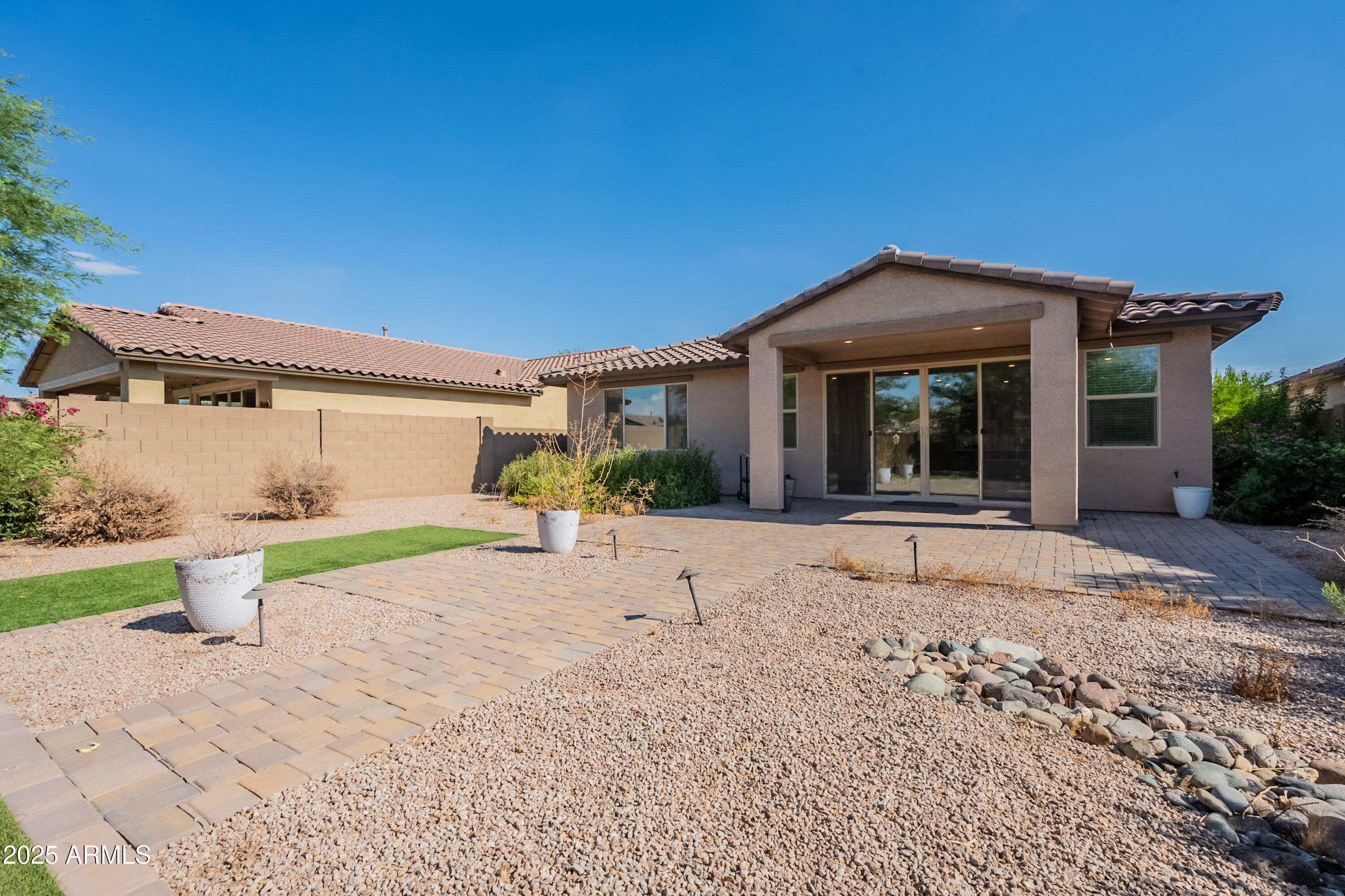 2816 West Pollack Street Phoenix, AZ 85041 - Photo 43 of 63 a view of a house with a patio