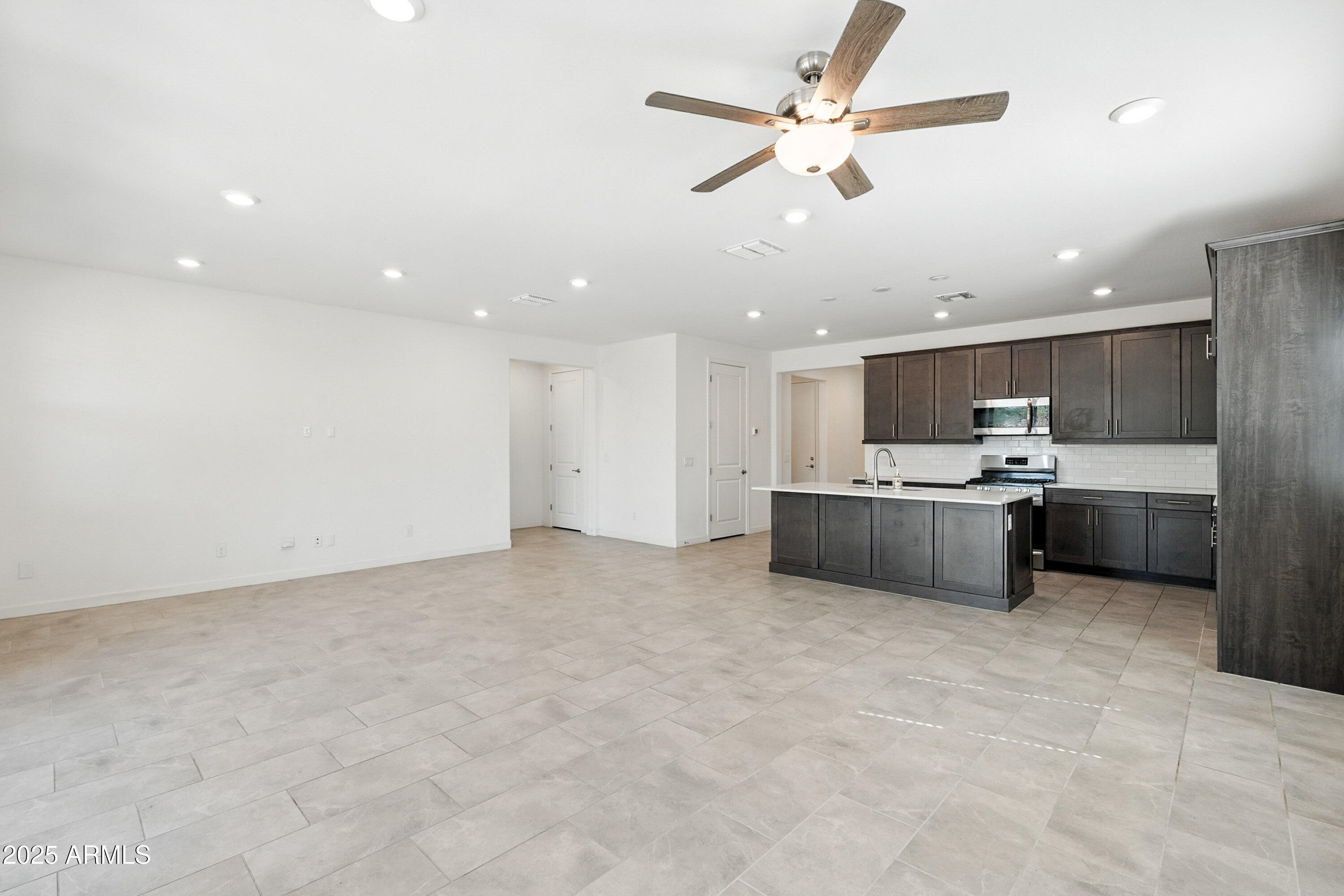 2816 West Pollack Street Phoenix, AZ 85041 - Photo 5 of 63 a view of a kitchen with a sink and a window