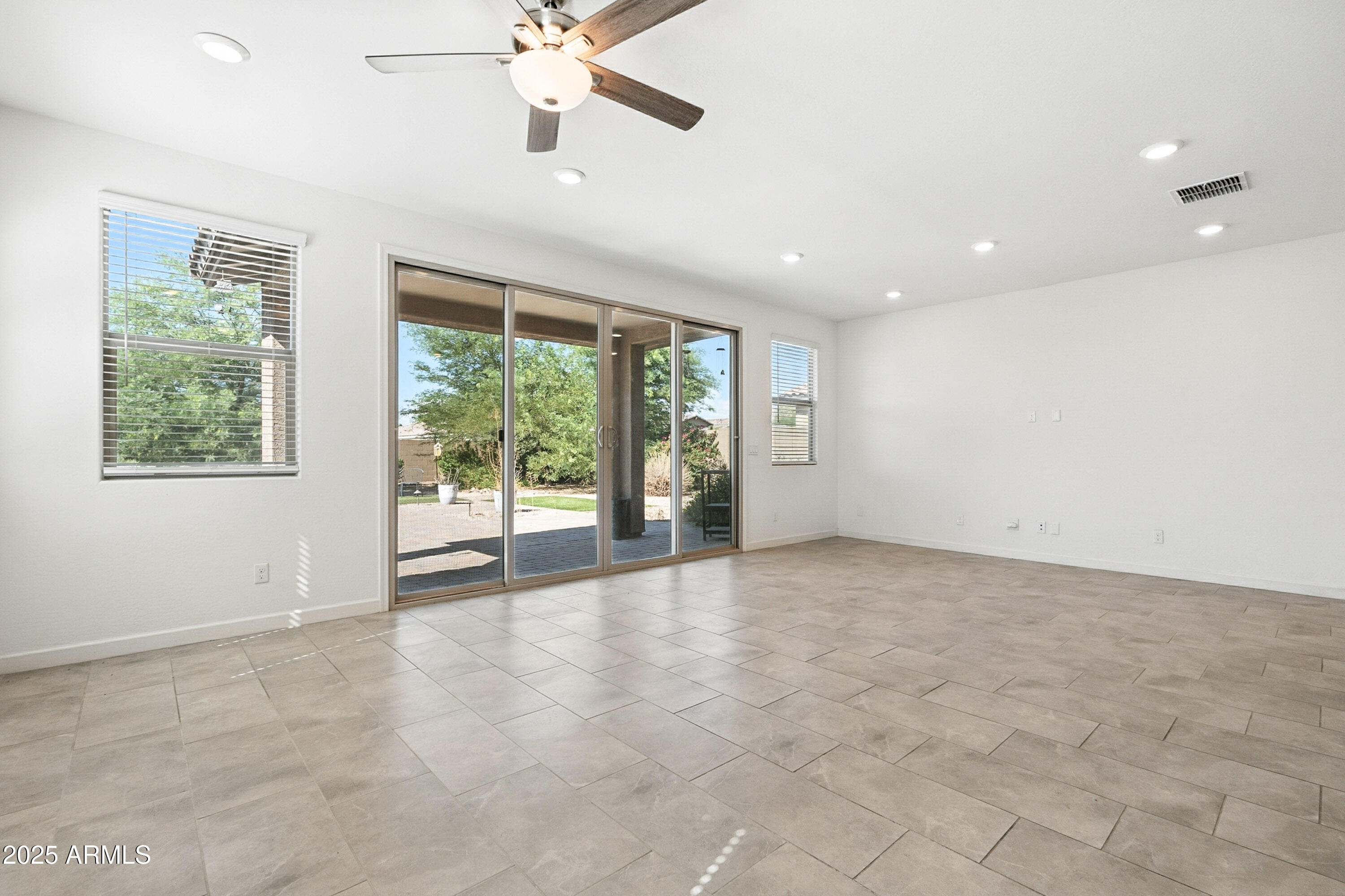 2816 West Pollack Street Phoenix, AZ 85041 - Photo 52 of 63 a view of an empty room with a window