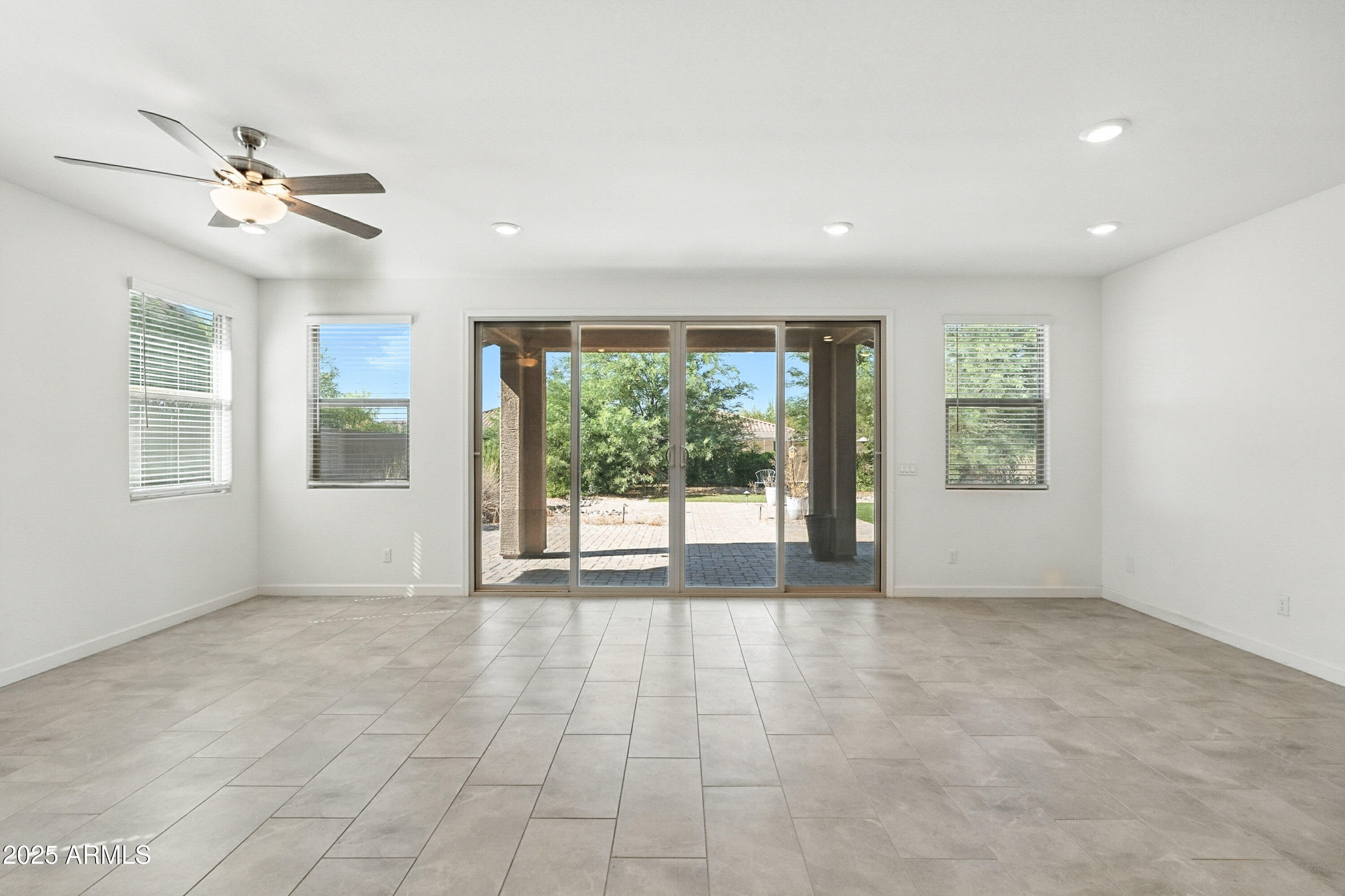 2816 West Pollack Street Phoenix, AZ 85041 - Photo 6 of 63 a view of an empty room with a window