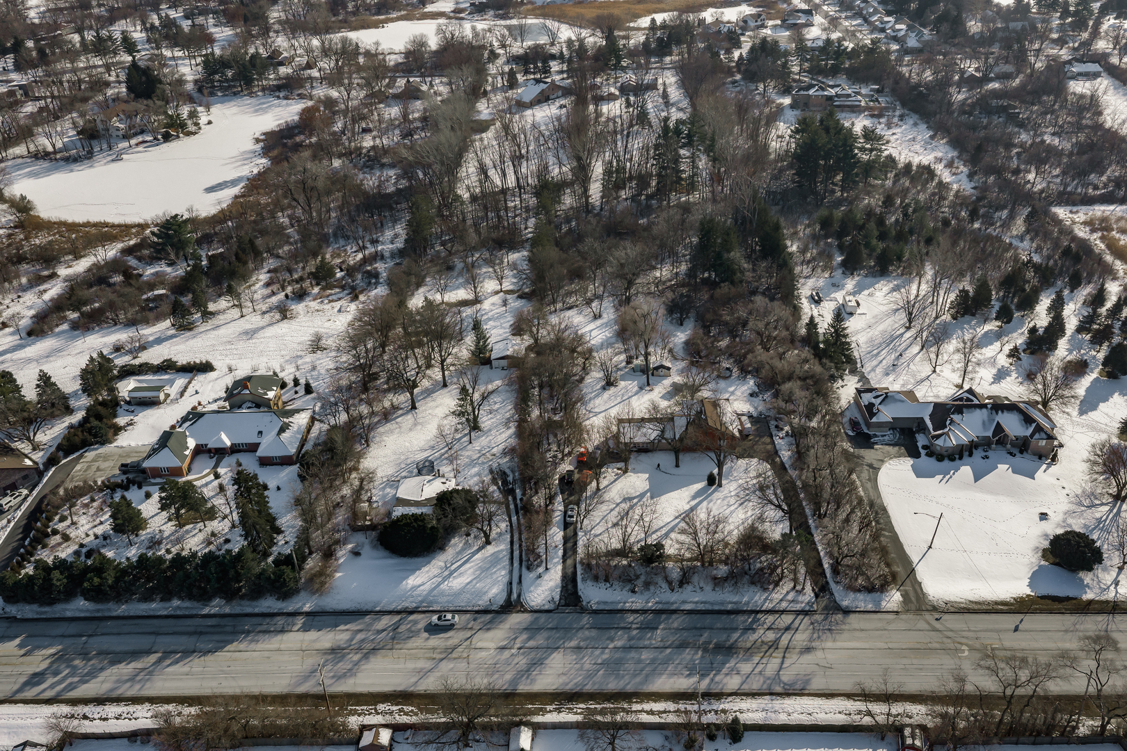 2985 87th Street Darien, IL 60561 - Photo 3 of 15 a view of covered with wooden fence