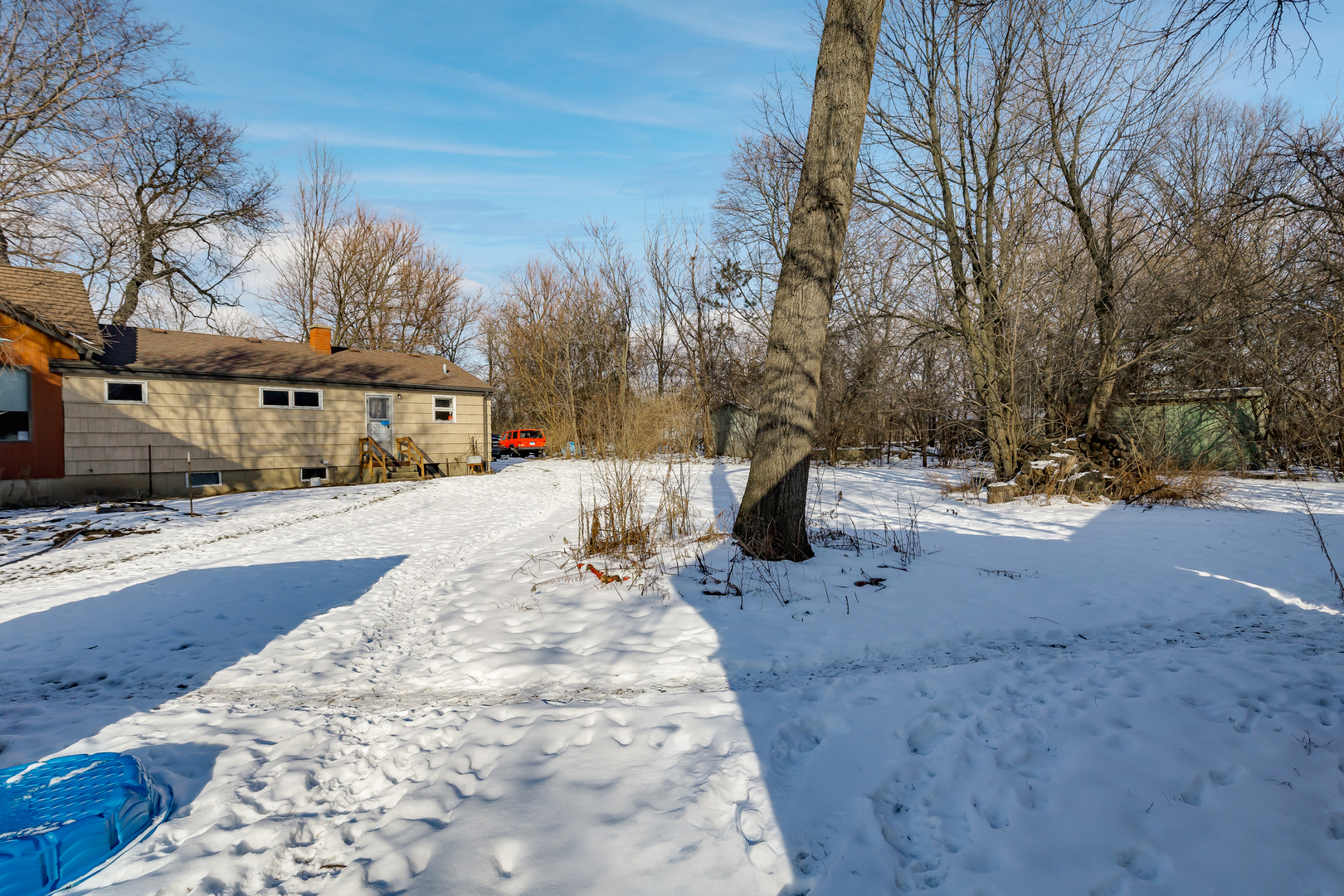 2985 87th Street Darien, IL 60561 - Photo 10 of 15 a view of road with large trees