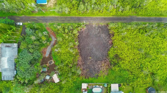 a view of swimming pool from a balcony