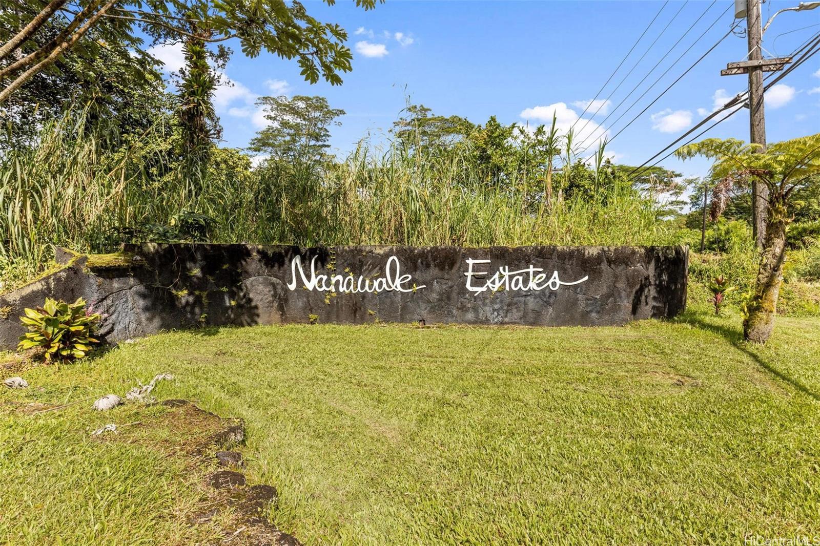 14-3440 Oahu Road, Unit LOT 917 Pahoa, HI 96778 - Photo 24 of 25 a view of outdoor space with garden and signage