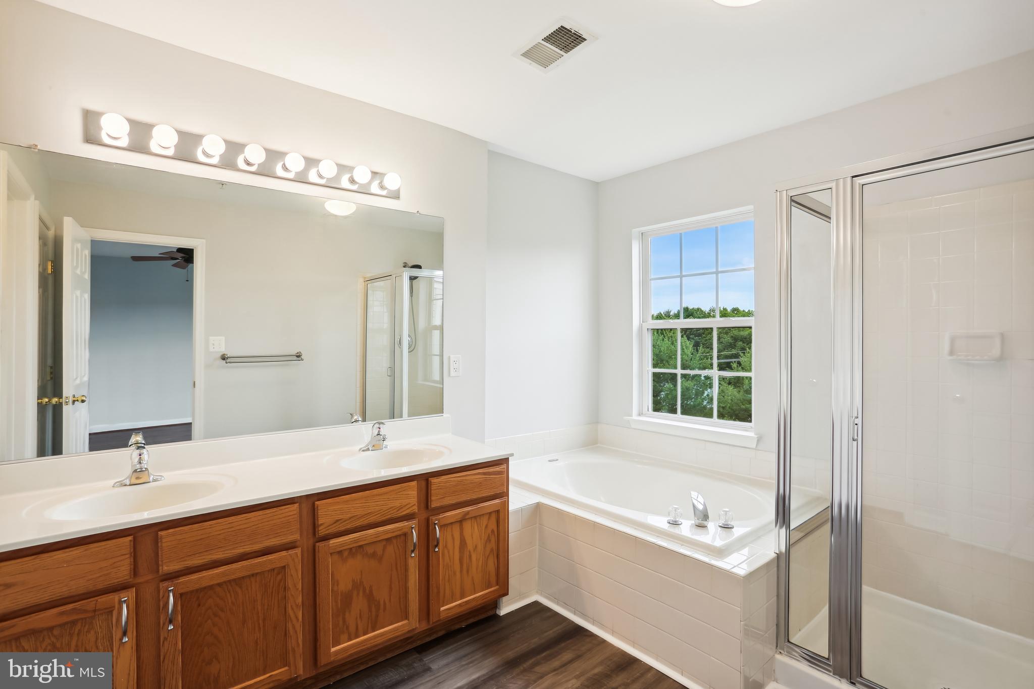 3 Inkberry Circle Gaithersburg, MD 20877 - Photo 21 of 52 Owner's Bath with Soaking Tub and Shower