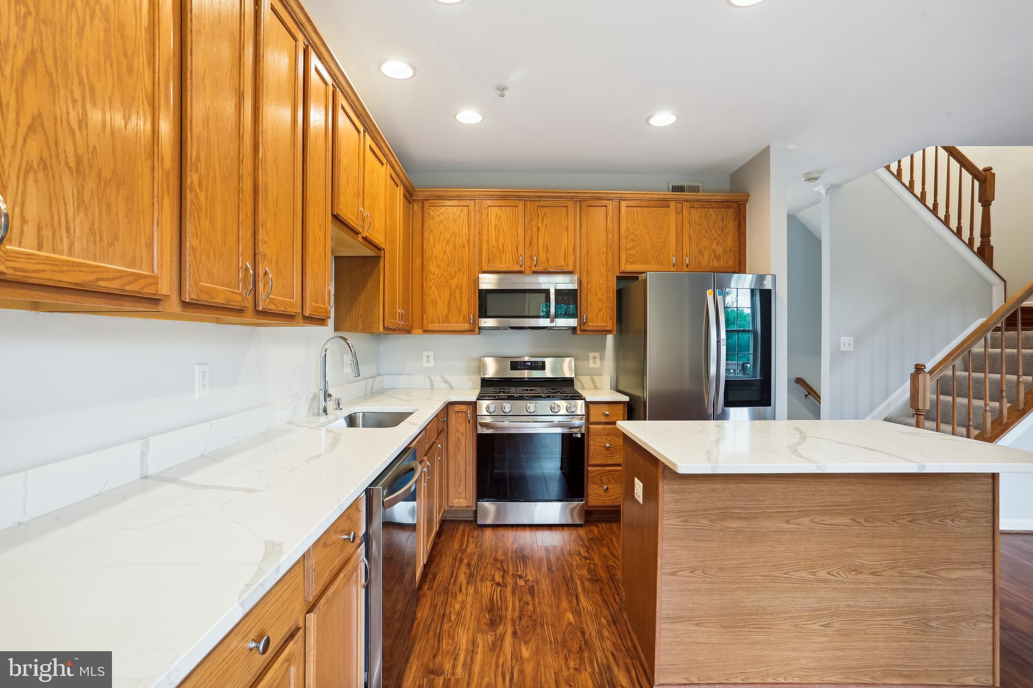 3 Inkberry Circle Gaithersburg, MD 20877 - Photo 7 of 52 Renovated Kitchen with New Quartz Countertops