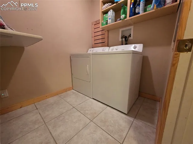 a view of a kitchen with a sink