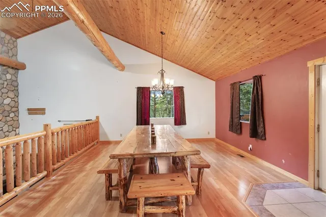 a large kitchen with kitchen island granite countertop a large counter top appliances and cabinets