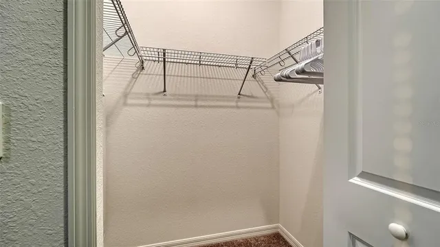 a aerial view of a house with garden space and street view