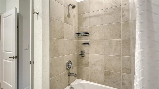 a view of a building with a yard