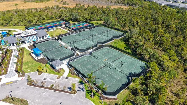 a front view of house with a garden