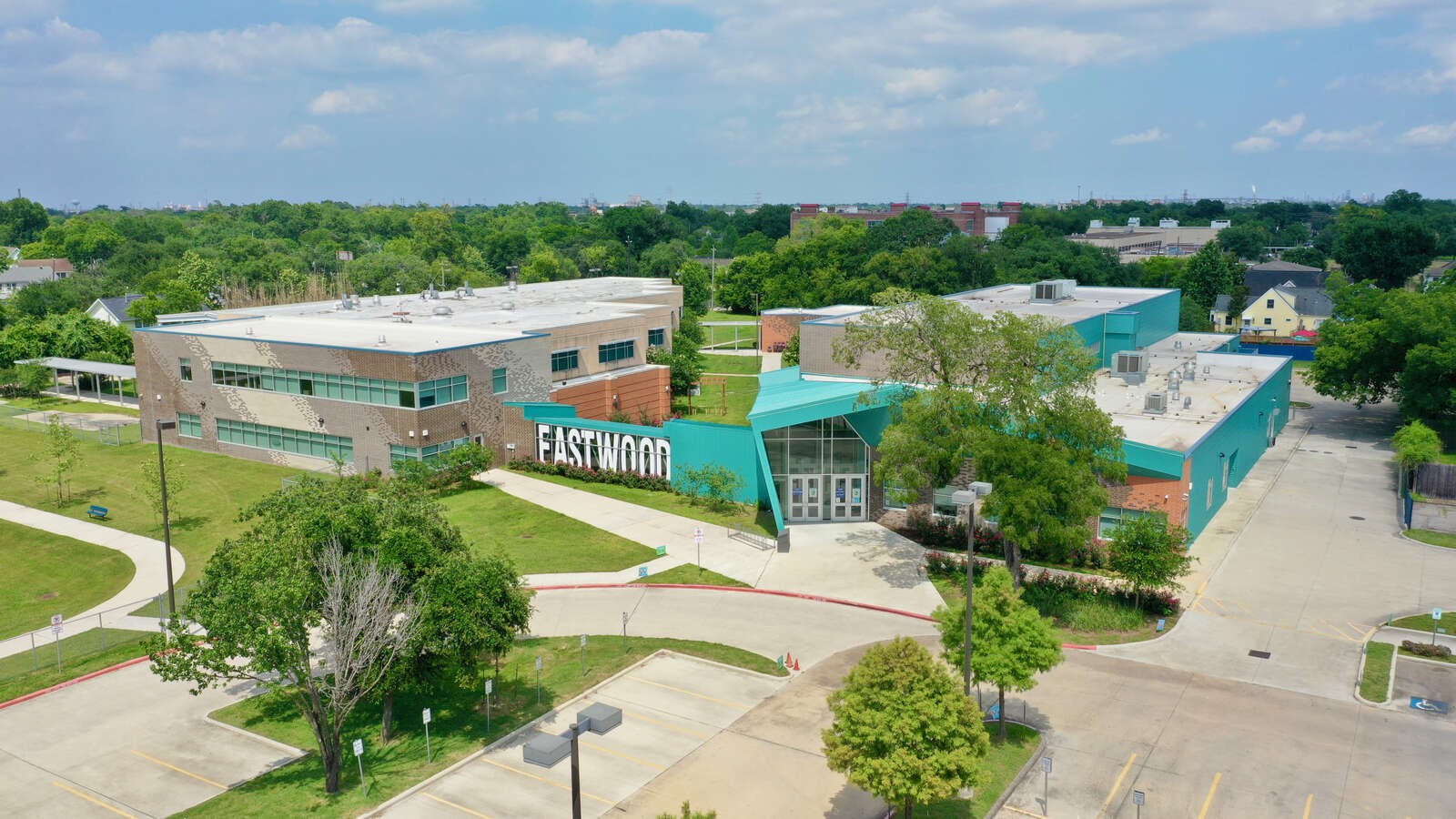 5229 Hillman Street, Unit A Houston, TX 77023 - Photo 45 of 50 a view of a city with lawn chairs and large trees