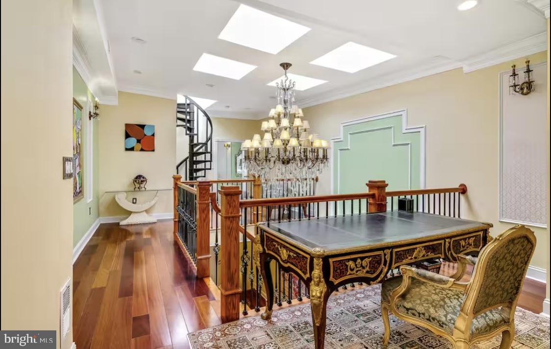 26 Strawberry Street Philadelphia, PA 19106 - Photo 24 of 64 a view of a dining room with furniture and a chandelier