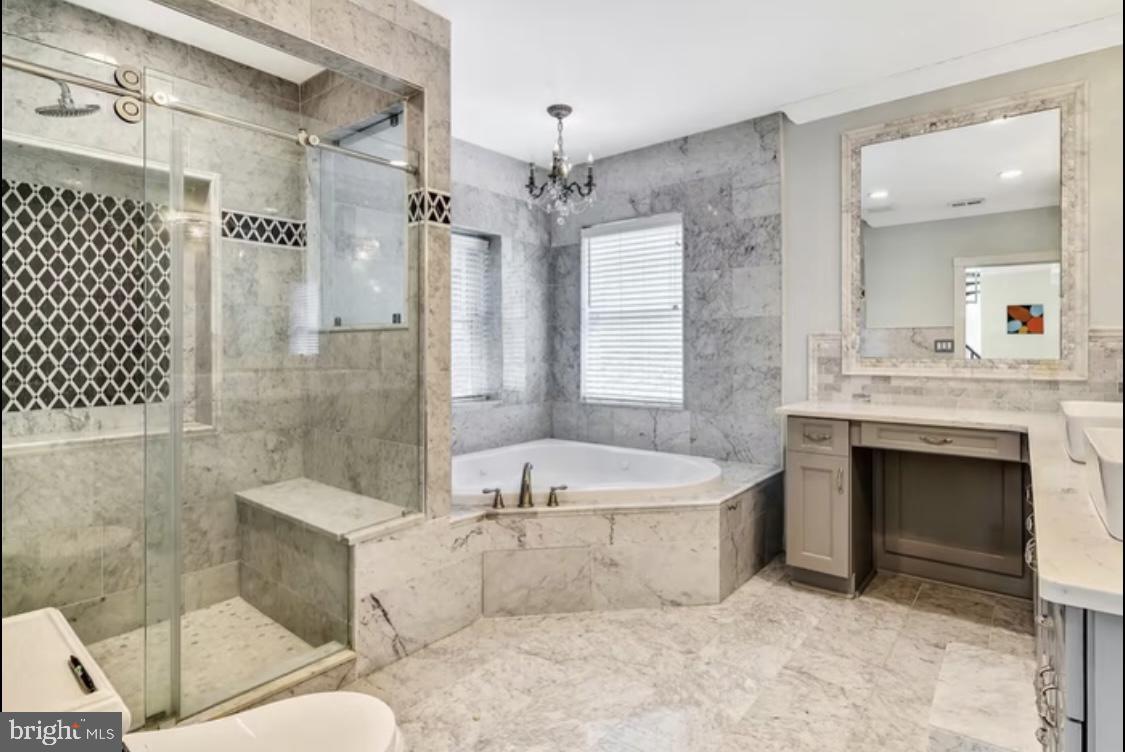 26 Strawberry Street Philadelphia, PA 19106 - Photo 29 of 64 a spacious bathroom with a tub sink shower and mirror