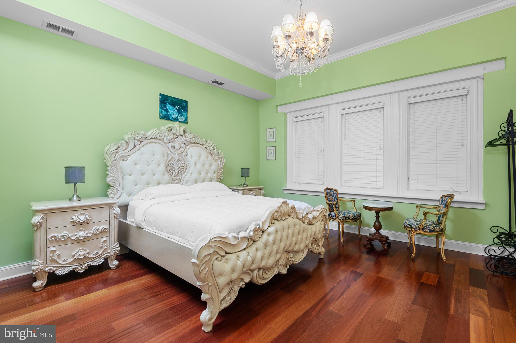 26 Strawberry Street Philadelphia, PA 19106 - Photo 34 of 64 a bedroom with a bed table and a chair