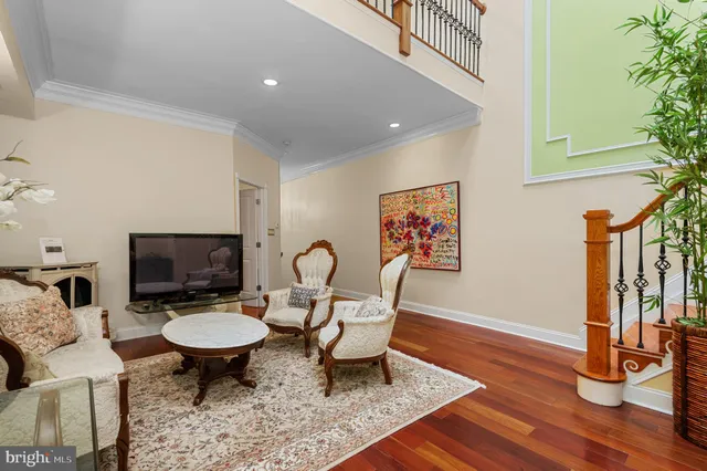 a bedroom with a bed and a table