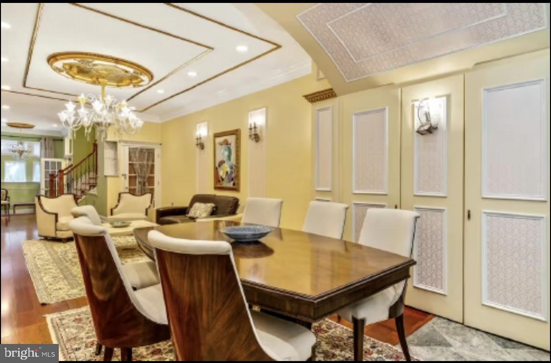 26 Strawberry Street Philadelphia, PA 19106 - Photo 9 of 64 a view of a dining room with furniture and a chandelier