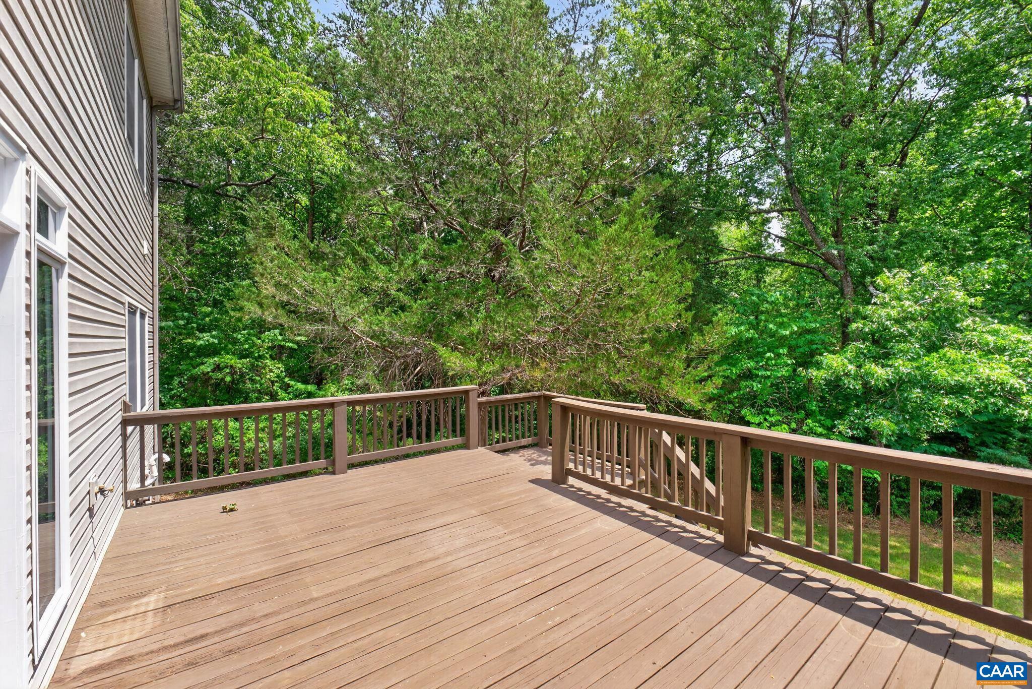 6285 Jarmans Gap Road Crozet, VA 22932 - Photo 42 of 65 a view of balcony with wooden floor and fence