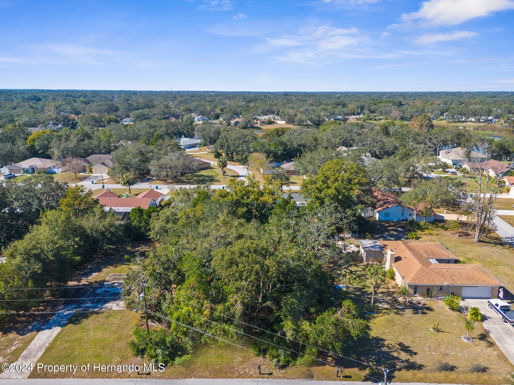 0 Candlewick Avenue Spring Hill, FL 34608 - Photo 4 of 9 an aerial view of multiple house