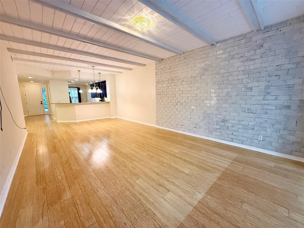 5511 Key W Place, Unit 5511 Bradenton, FL 34203 - Photo 26 of 39 a view of a hardwood floor in a room