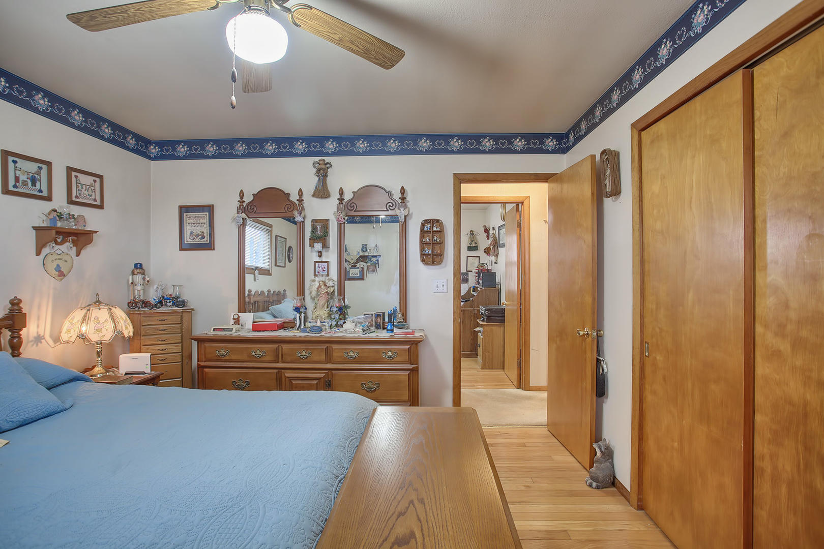 408 Kyle Street Ogden, IL 61859 - Photo 15 of 24 a very nice looking room with a large mirror and furniture