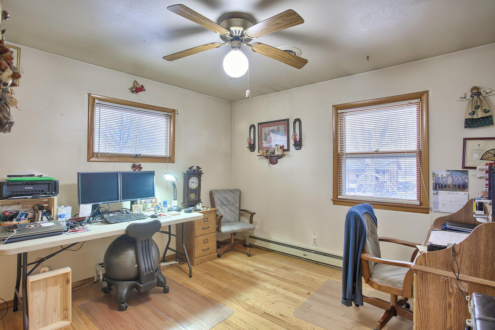 408 Kyle Street Ogden, IL 61859 - Photo 16 of 24 a view of a workspace with furniture and a workspace