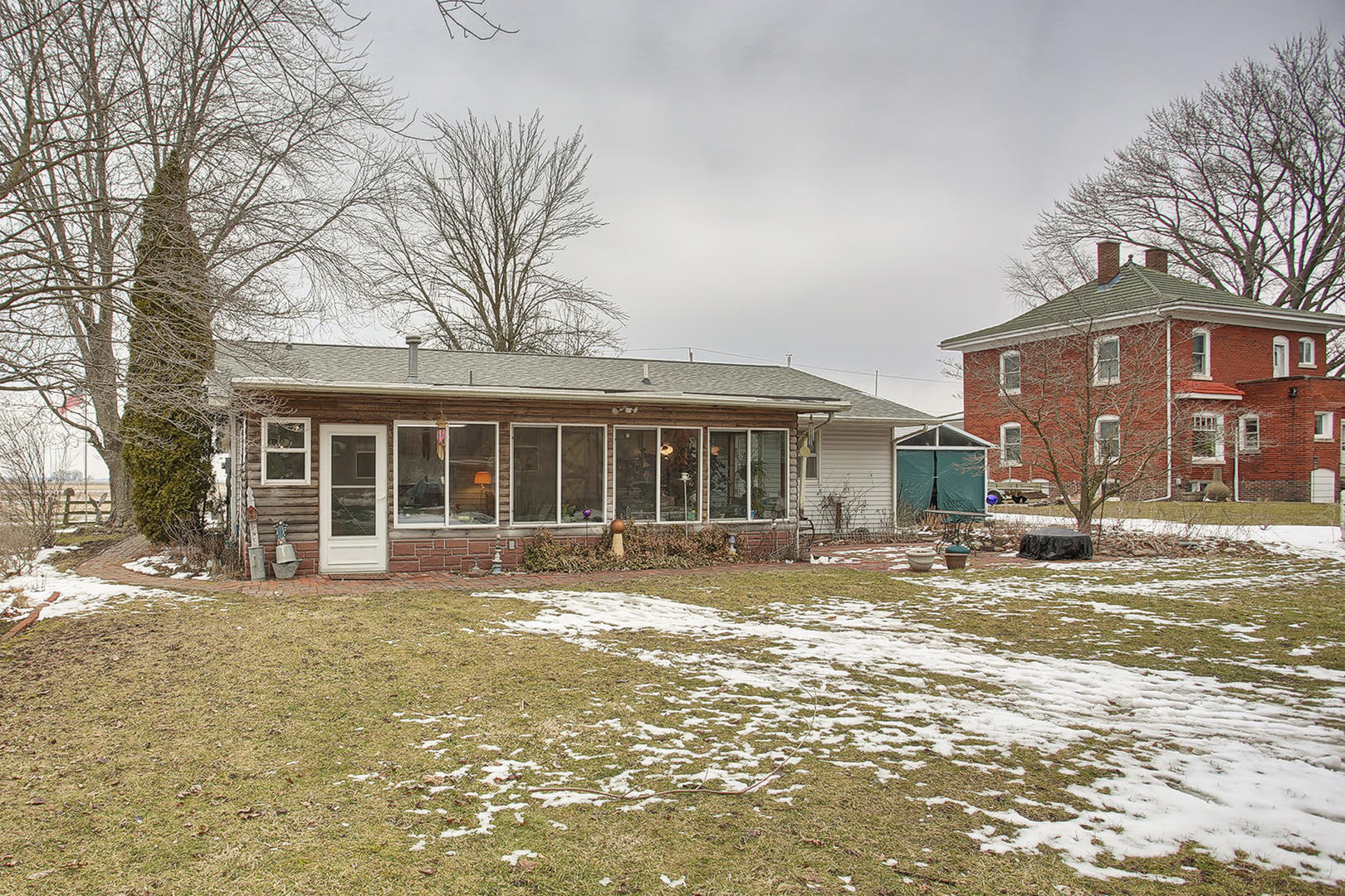 408 Kyle Street Ogden, IL 61859 - Photo 20 of 24 a front view of a house with a yard