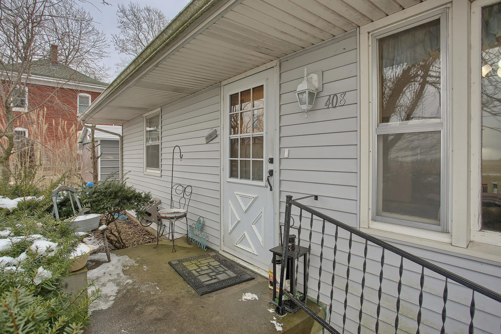 408 Kyle Street Ogden, IL 61859 - Photo 24 of 24 a view of a house with a small yard and wooden floor and fence