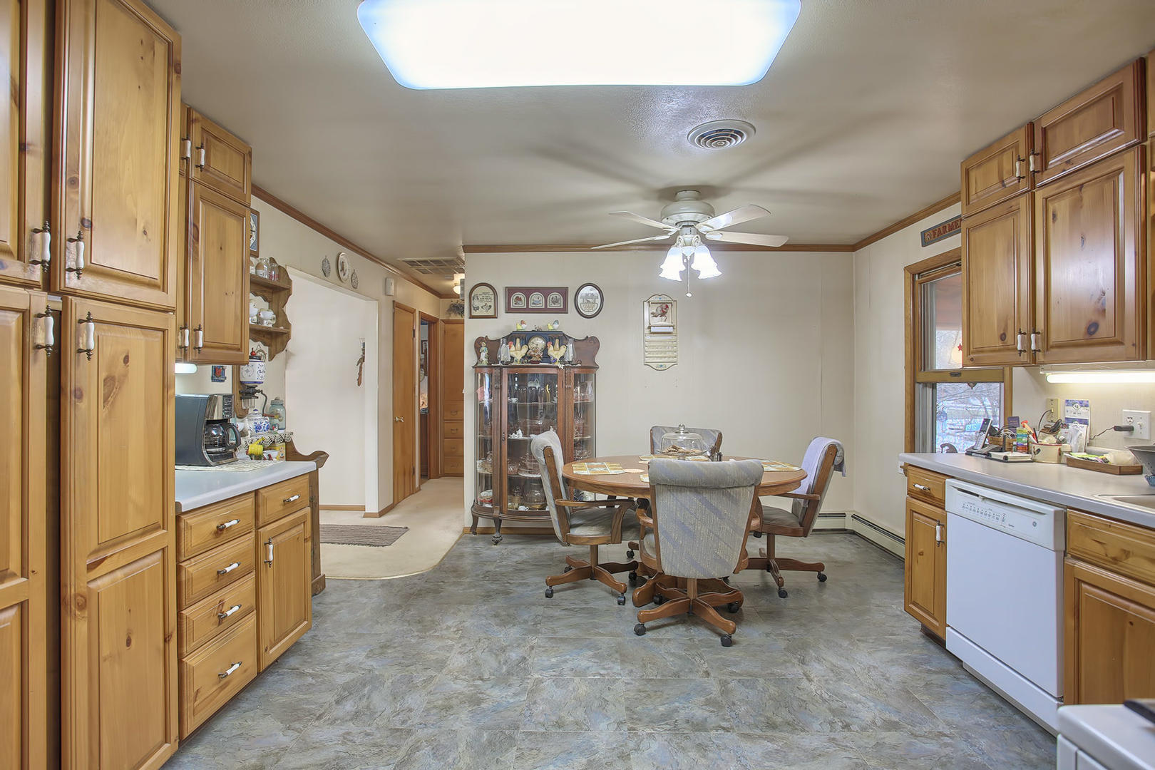 408 Kyle Street Ogden, IL 61859 - Photo 6 of 24 a view of a dining room with furniture and chandelier