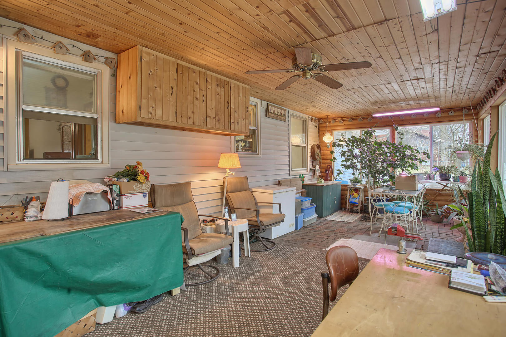 408 Kyle Street Ogden, IL 61859 - Photo 10 of 24 a backyard of a house with outdoor seating