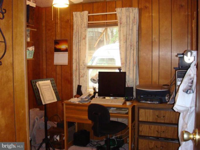 19515 Frederick Road, Unit 191 Germantown, MD 20876 - Photo 5 of 13 a view of a workspace with furniture and a window