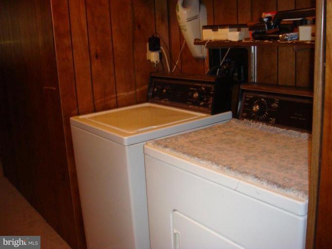 19515 Frederick Road, Unit 191 Germantown, MD 20876 - Photo 7 of 13 a utility room with dryer and washer