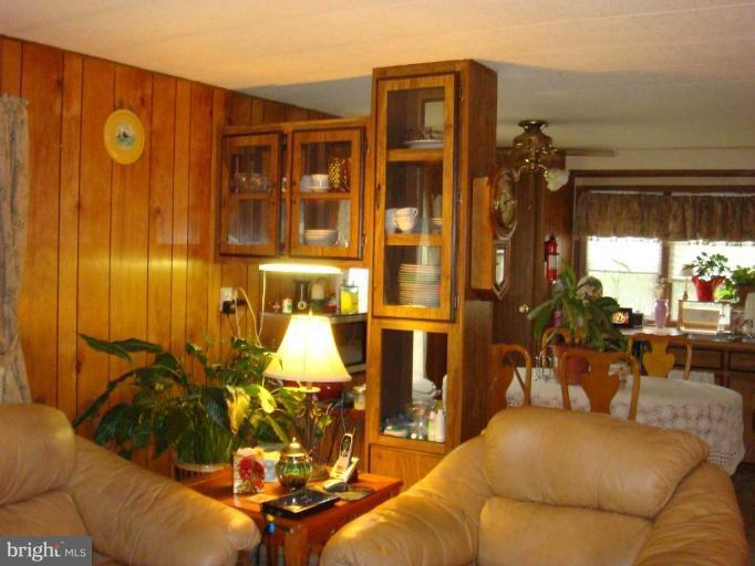 19515 Frederick Road, Unit 191 Germantown, MD 20876 - Photo 10 of 13 a living room with furniture and a large window
