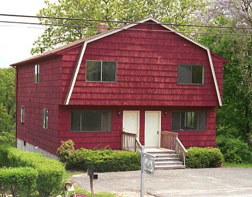 873 Howe Avenue Shelton, CT 06484 - Photo 1 of 1 a view of a house with a yard